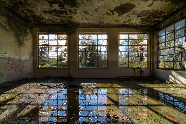 lost place italy: abandoned cotton mill. Water reflections